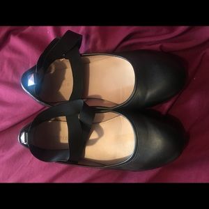 Torrid black flats with elastic ankle straps.